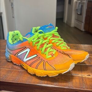 Used Mens Balance Orange and Green Sneakers Vibrant Athletic Design